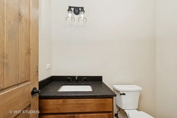 a bathroom with a sink and a toilet