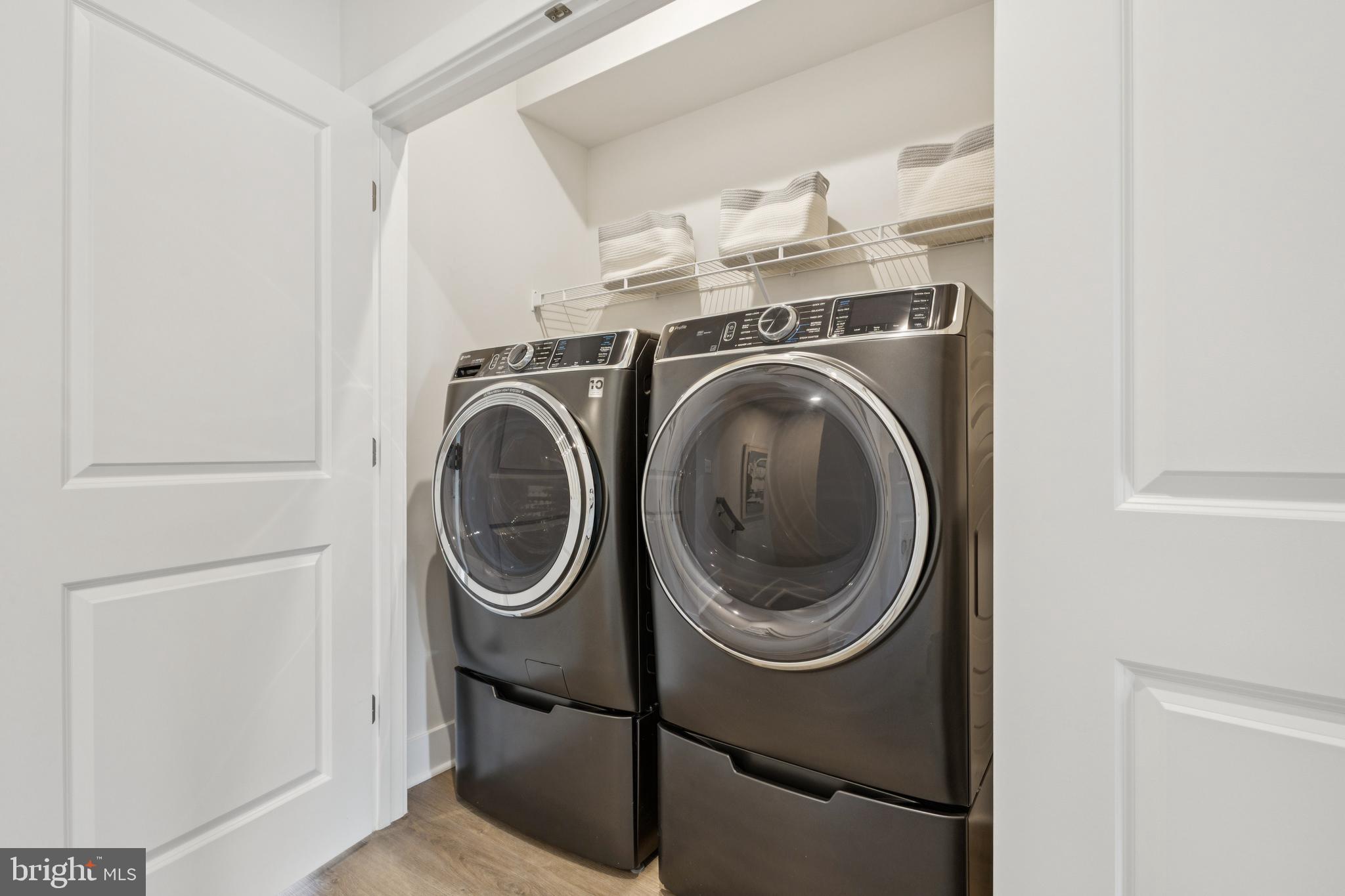 11228 Einstein Street Manassas, VA 20110 - Photo 18 of 22 a utility room with dryer and washer