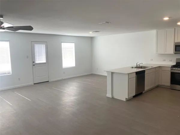 an empty room with windows