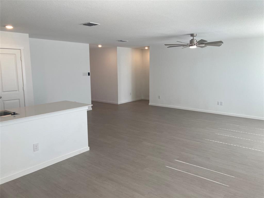 1520 Elliott Road Howe, TX 75459 - Photo 15 of 29 a view of an empty room with a ceiling fan
