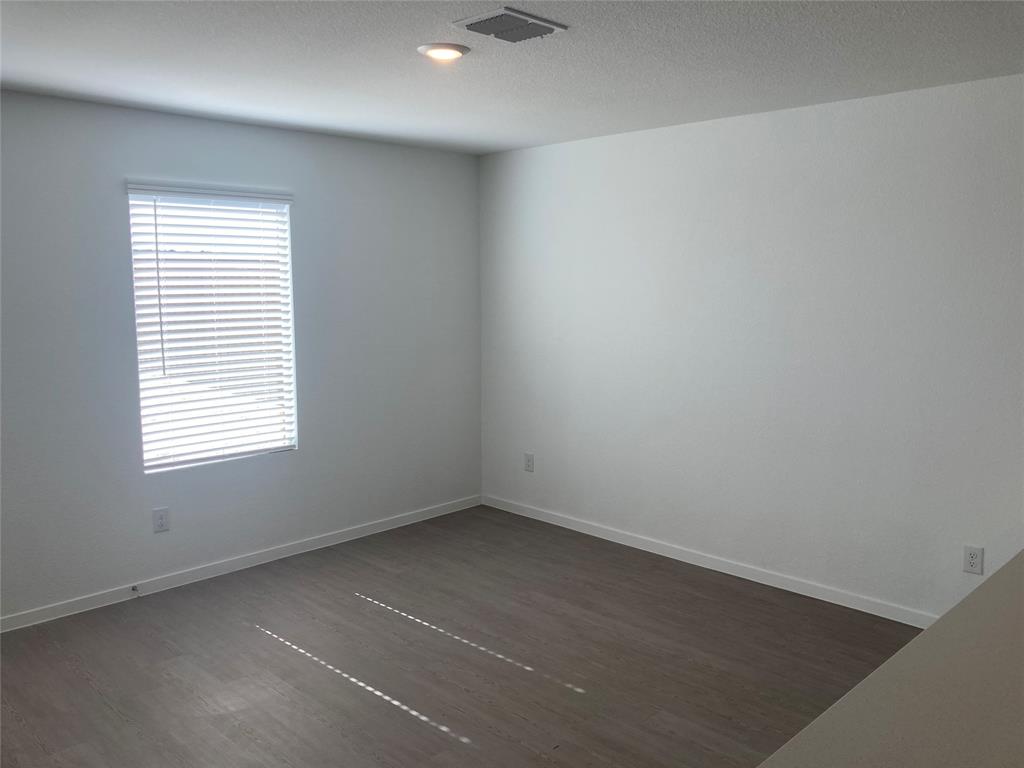 1520 Elliott Road Howe, TX 75459 - Photo 19 of 29 an empty room with a window