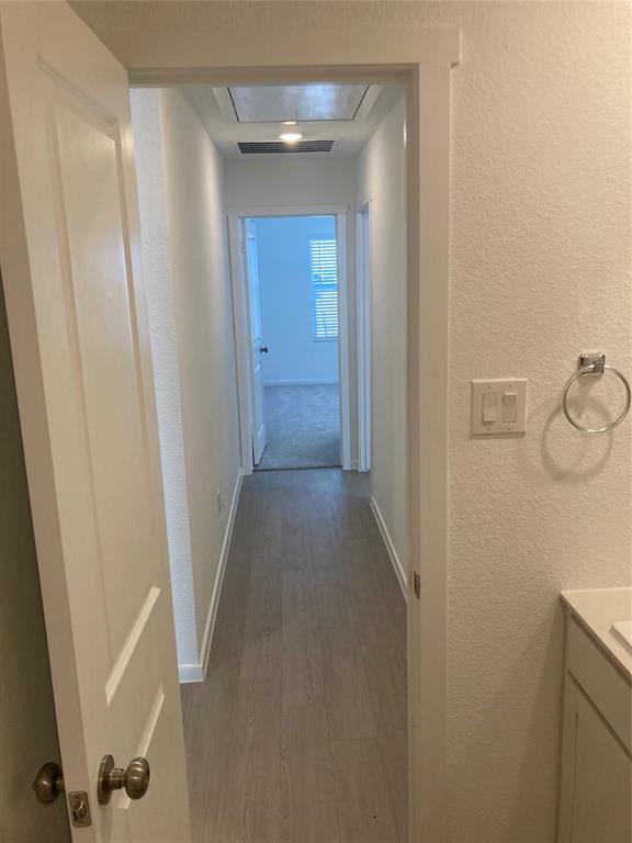 1520 Elliott Road Howe, TX 75459 - Photo 23 of 29 a view of a hallway with wooden floor