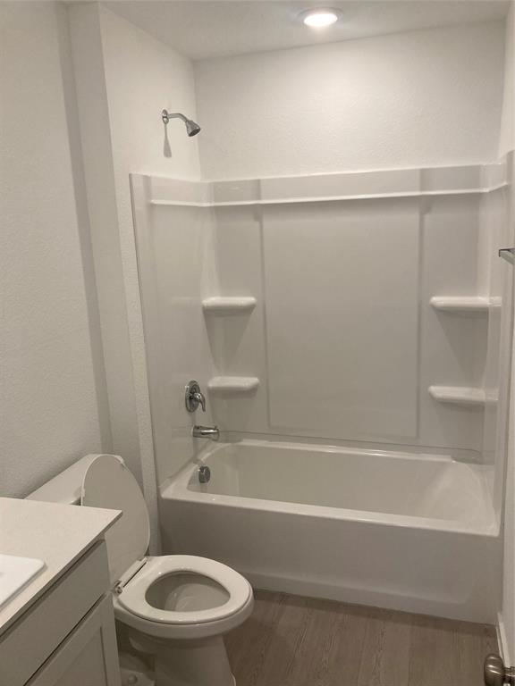 1520 Elliott Road Howe, TX 75459 - Photo 25 of 29 a bathroom with a toilet and a bathtub