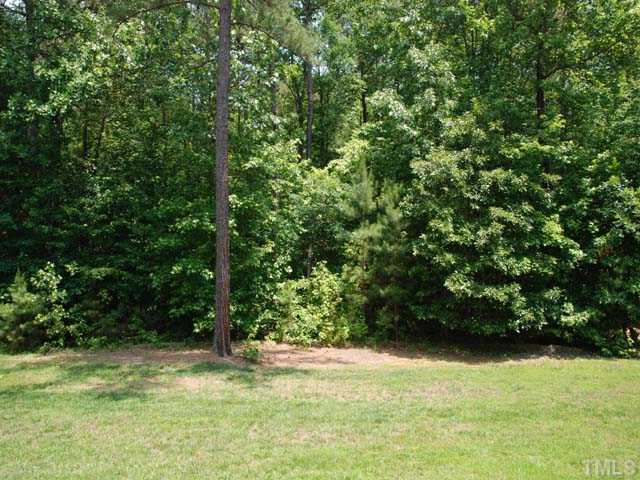 1005 Farnsworth Road Wake Forest, NC 27587 - Photo 25 of 25 The gorgeous home has a 2.28 acre wooded and very private yard.