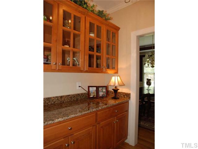 1005 Farnsworth Road Wake Forest, NC 27587 - Photo 6 of 25 The butlers pantry has marble countertops and offers plenty of cabinet and counter space.
