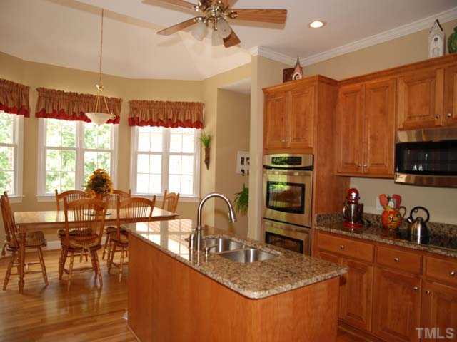 1005 Farnsworth Road Wake Forest, NC 27587 - Photo 10 of 25 The dueal ovens, built in microwave and smooth cook surface makes cooking a pleasure.