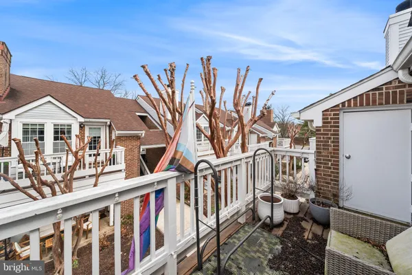 a view of a house with backyard and porch
