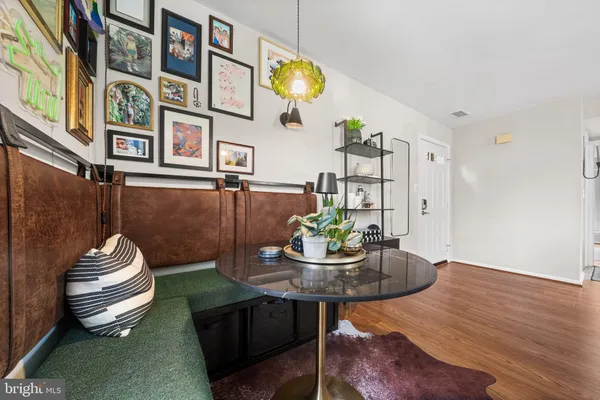 a view of a dining room with furniture