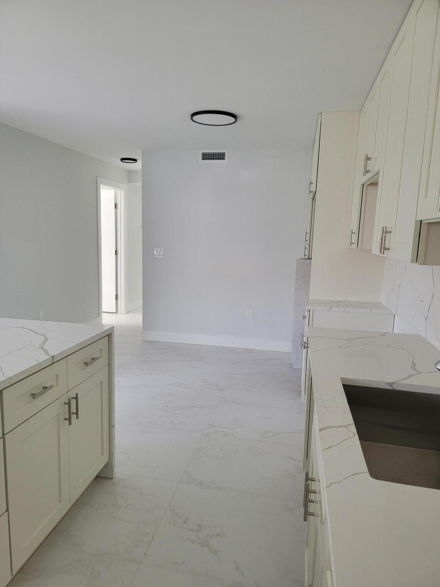 240 Southwest 7th Street, Unit 9 Boca Raton, FL 33432 - Photo 3 of 25 20260623_114019