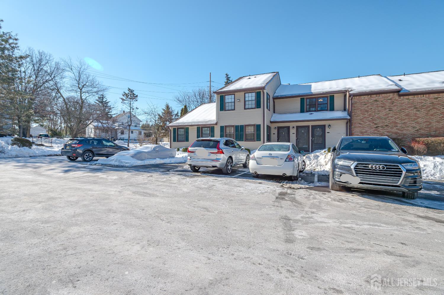 70-10 Prospect Street, Unit 10 Metuchen, NJ 08840 - Photo 20 of 20 a car parked in front of a building