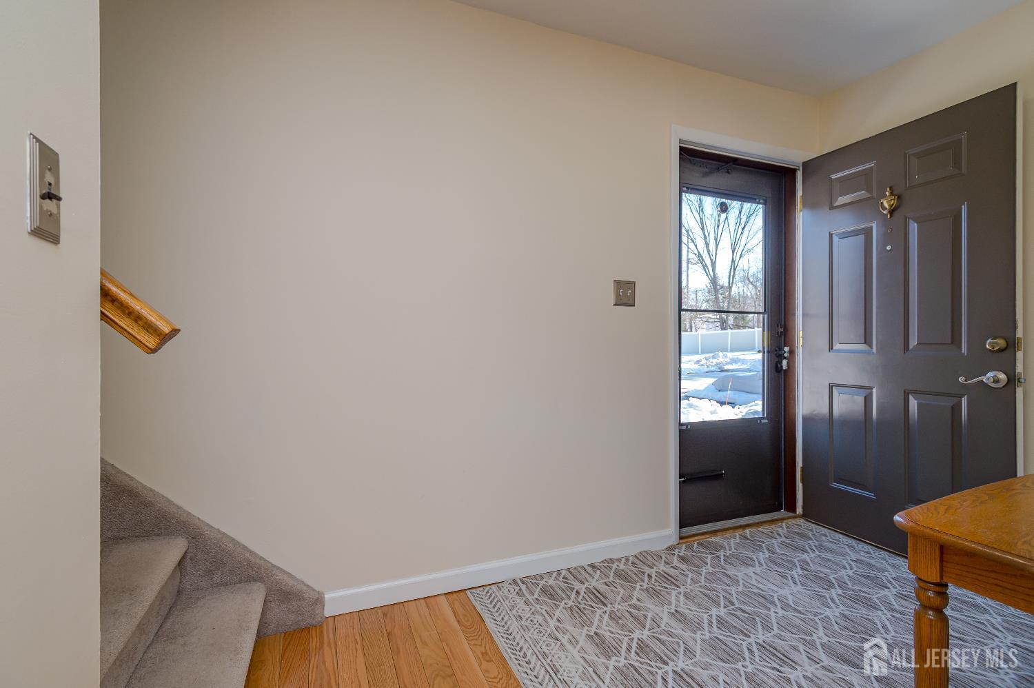 70-10 Prospect Street, Unit 10 Metuchen, NJ 08840 - Photo 2 of 20 a view of an entryway with a window