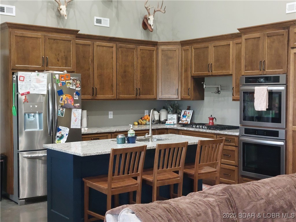 6565-6567 Jay Bird Road Florence, MO 65329 - Photo 7 of 70 Granite countertops, double oven gas cooktop, cent