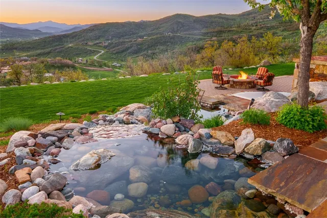 a view of a lake with a yard