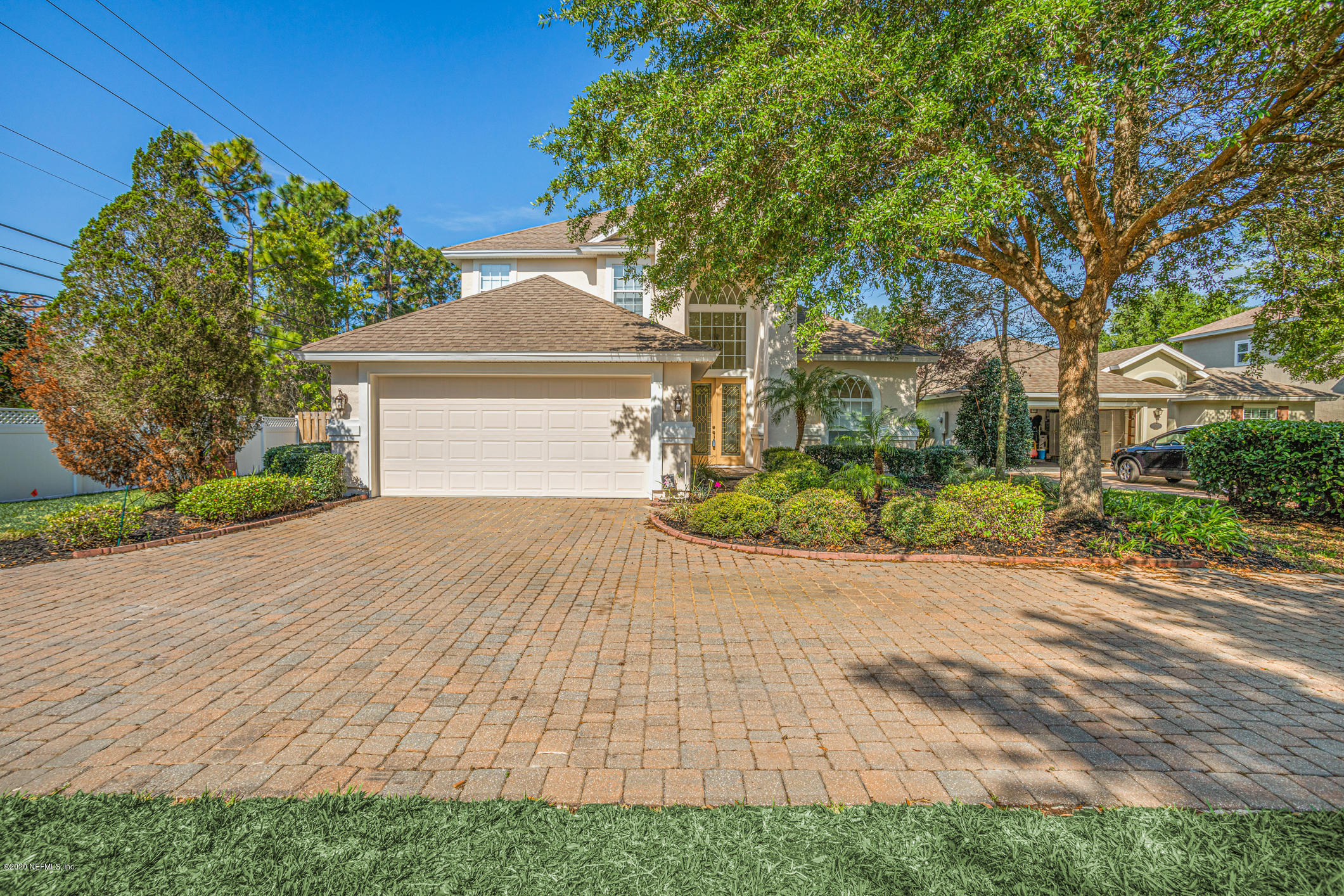 2021 Sailview Road St. Johns, FL 32259 - Photo 1 of 45 a front view of a house with a yard and garage