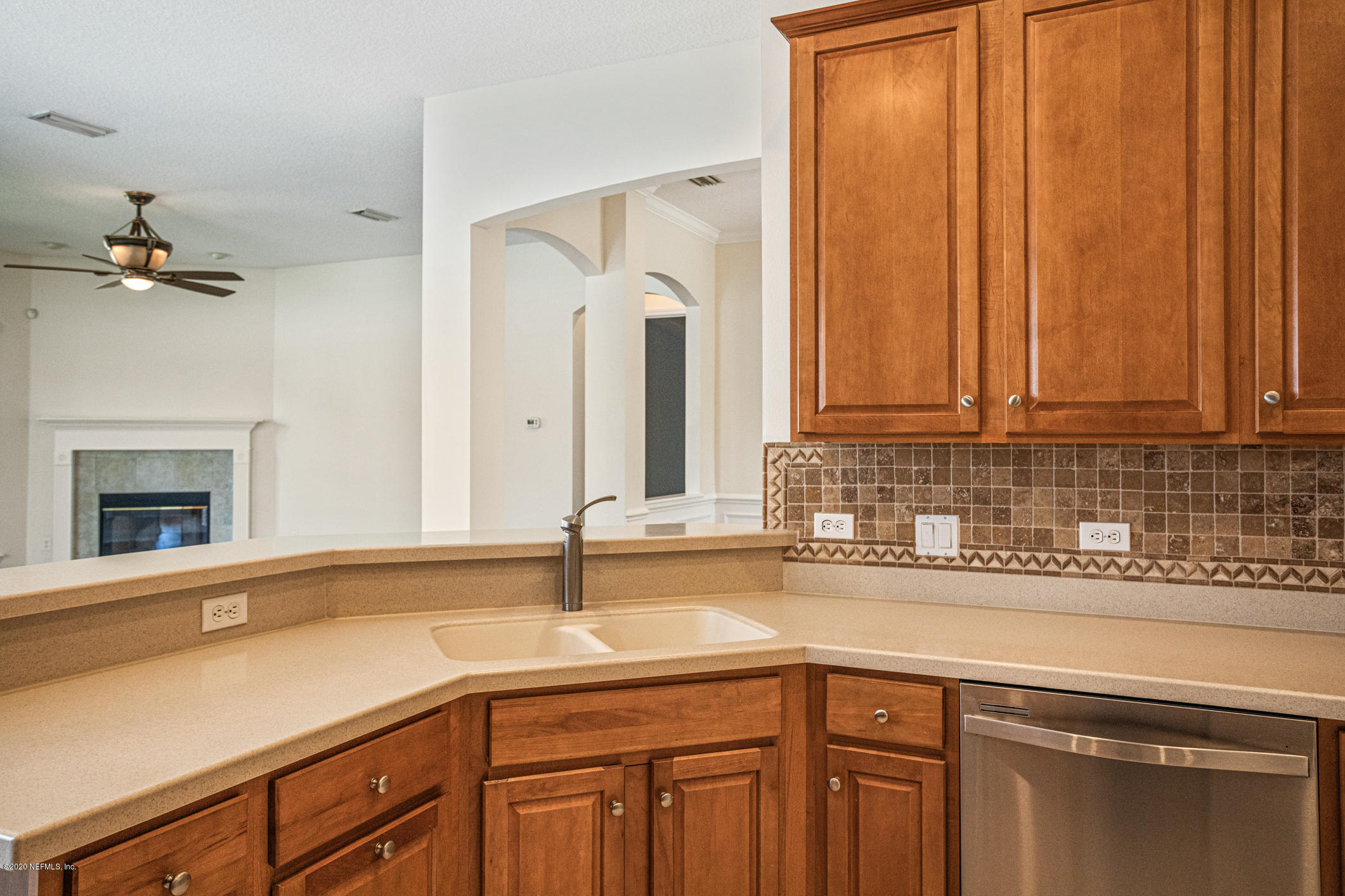 2021 Sailview Road St. Johns, FL 32259 - Photo 11 of 45 a kitchen with a sink and cabinets