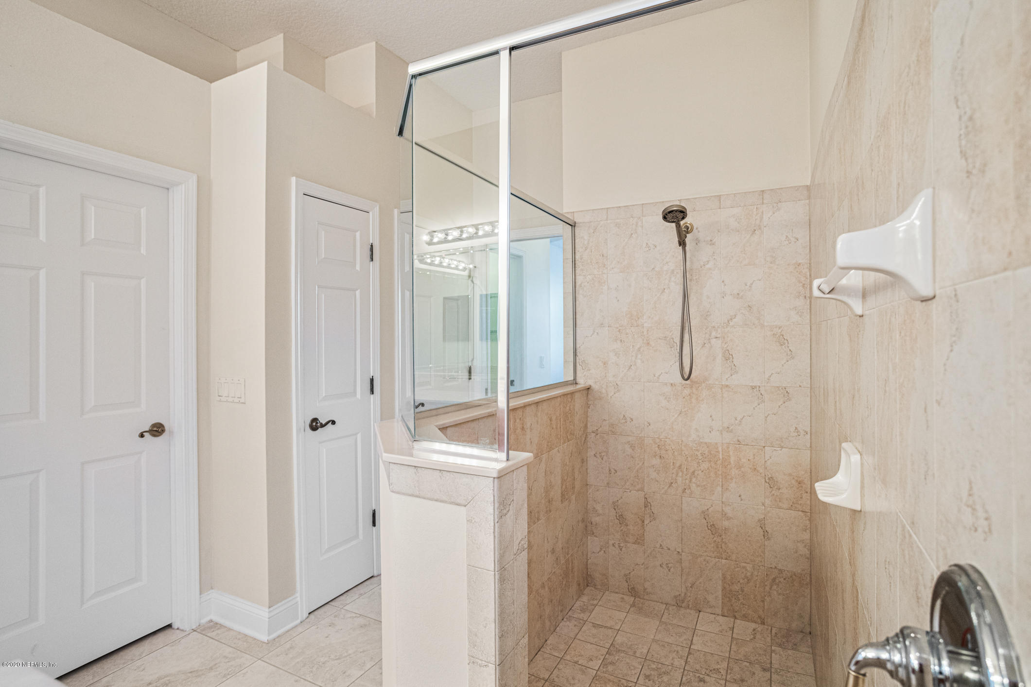 2021 Sailview Road St. Johns, FL 32259 - Photo 17 of 45 a bathroom with a shower and a glass door