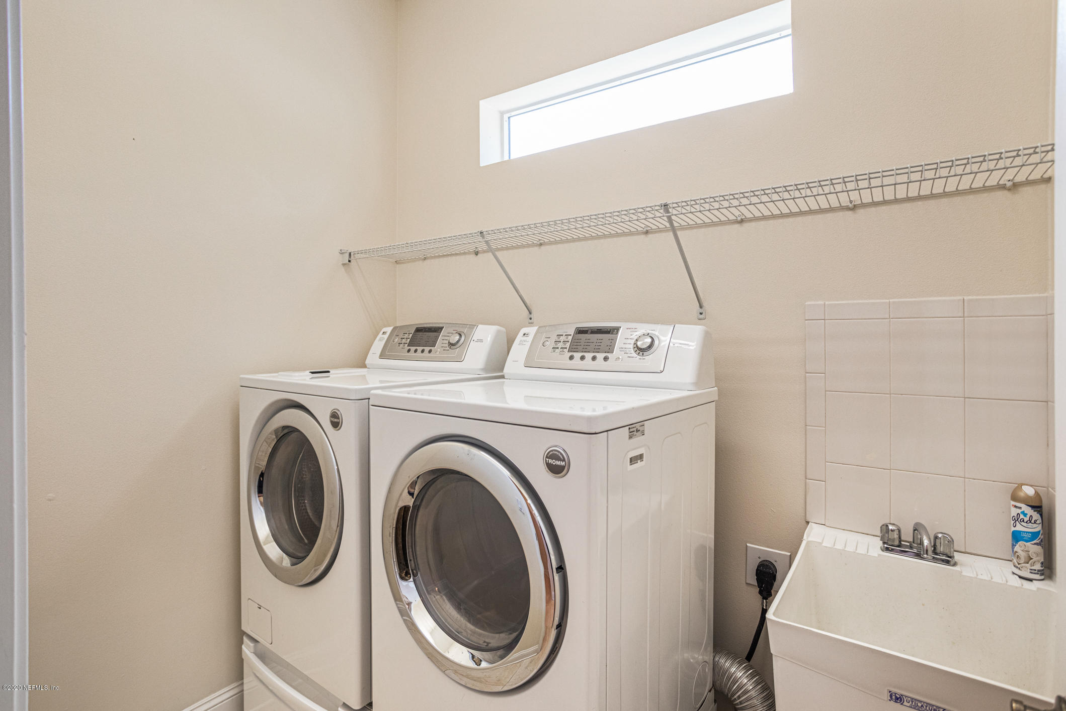 2021 Sailview Road St. Johns, FL 32259 - Photo 20 of 45 a utility room with dryer and washer