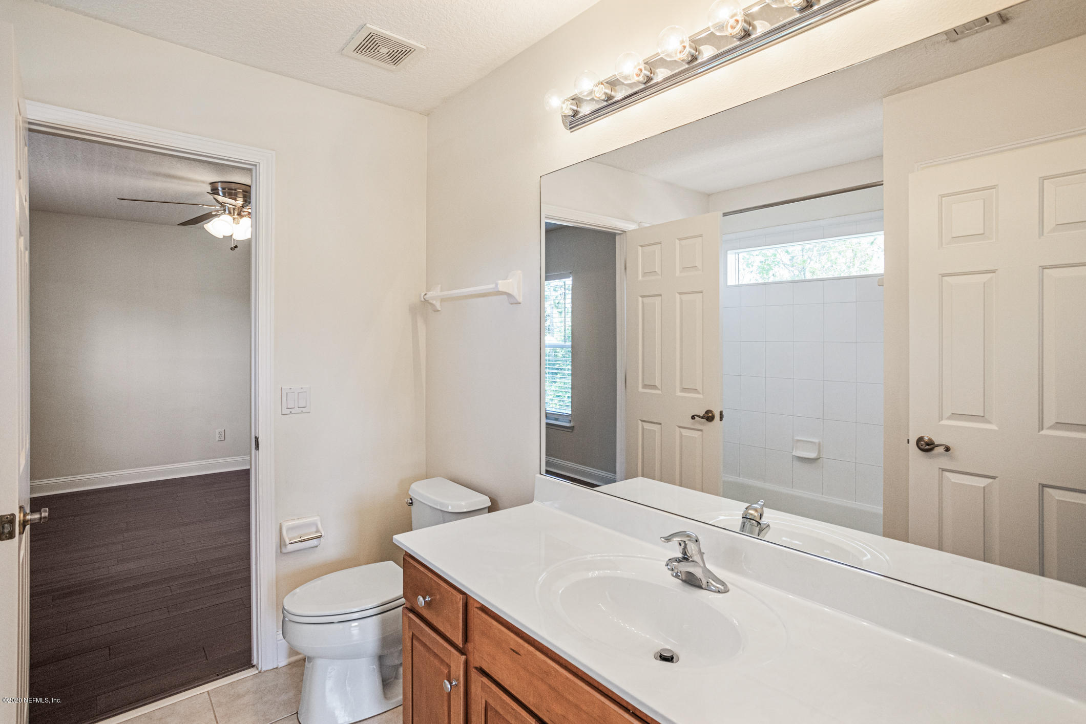 2021 Sailview Road St. Johns, FL 32259 - Photo 21 of 45 a bathroom with a sink toilet and shower