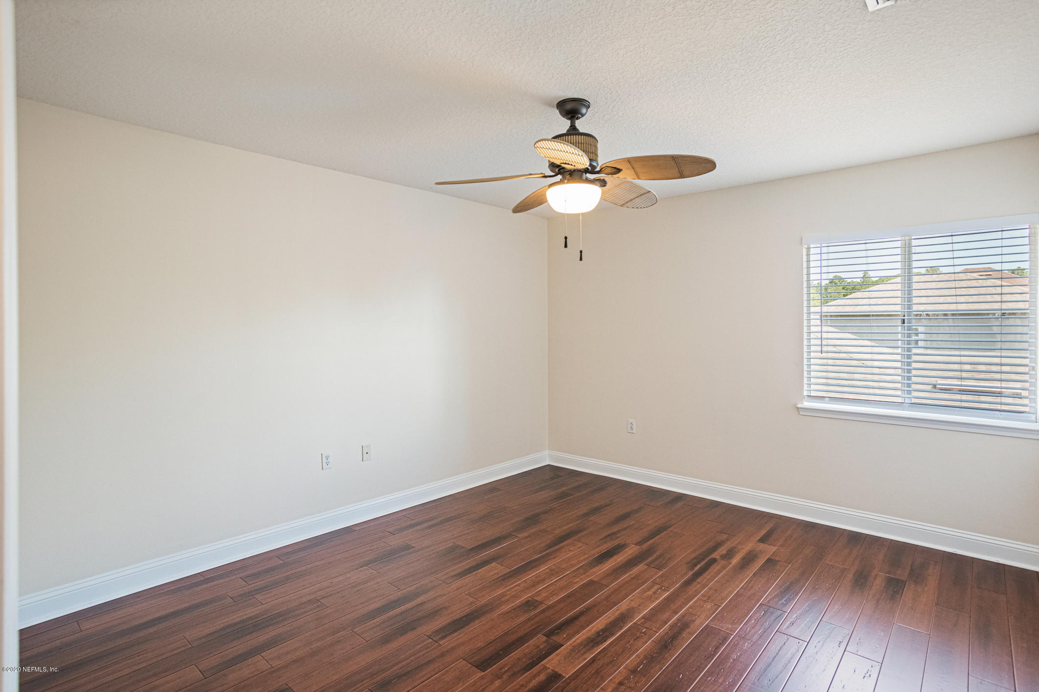 2021 Sailview Road St. Johns, FL 32259 - Photo 25 of 45 a view of a room with wooden floor and windows