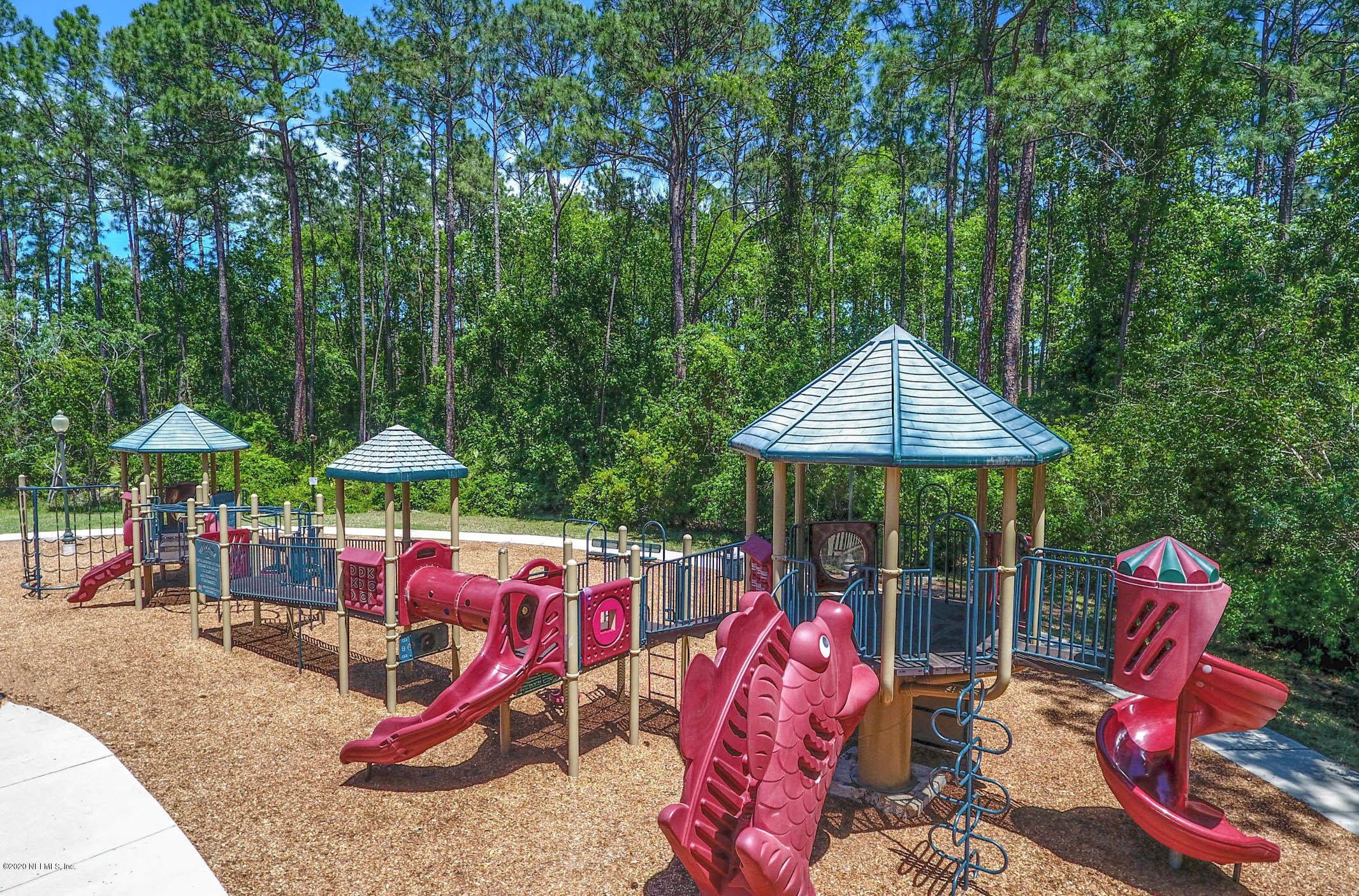 2021 Sailview Road St. Johns, FL 32259 - Photo 40 of 45 an outdoor space with furniture and umbrella