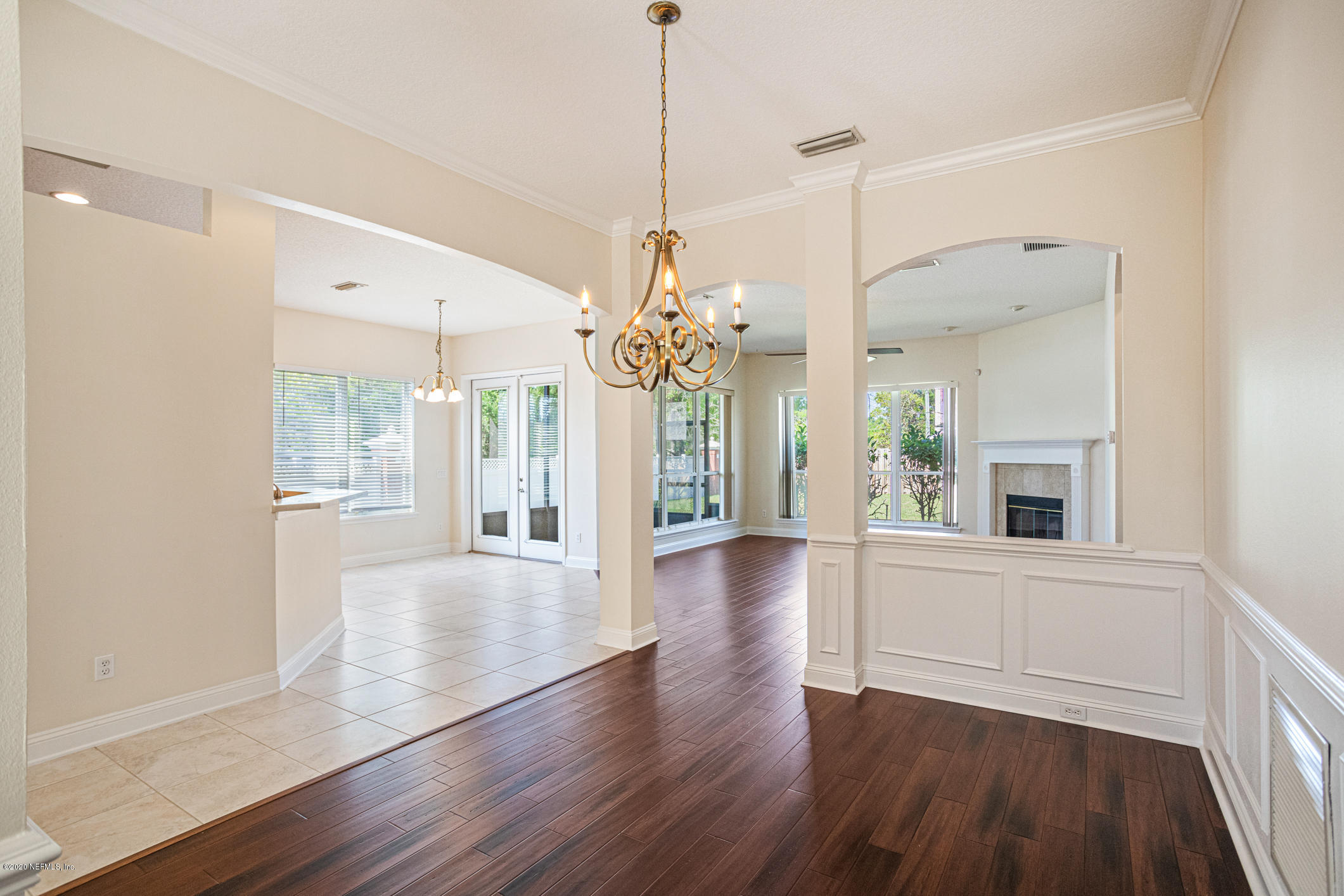 2021 Sailview Road St. Johns, FL 32259 - Photo 4 of 45 a view of an empty room with wooden floor and a window