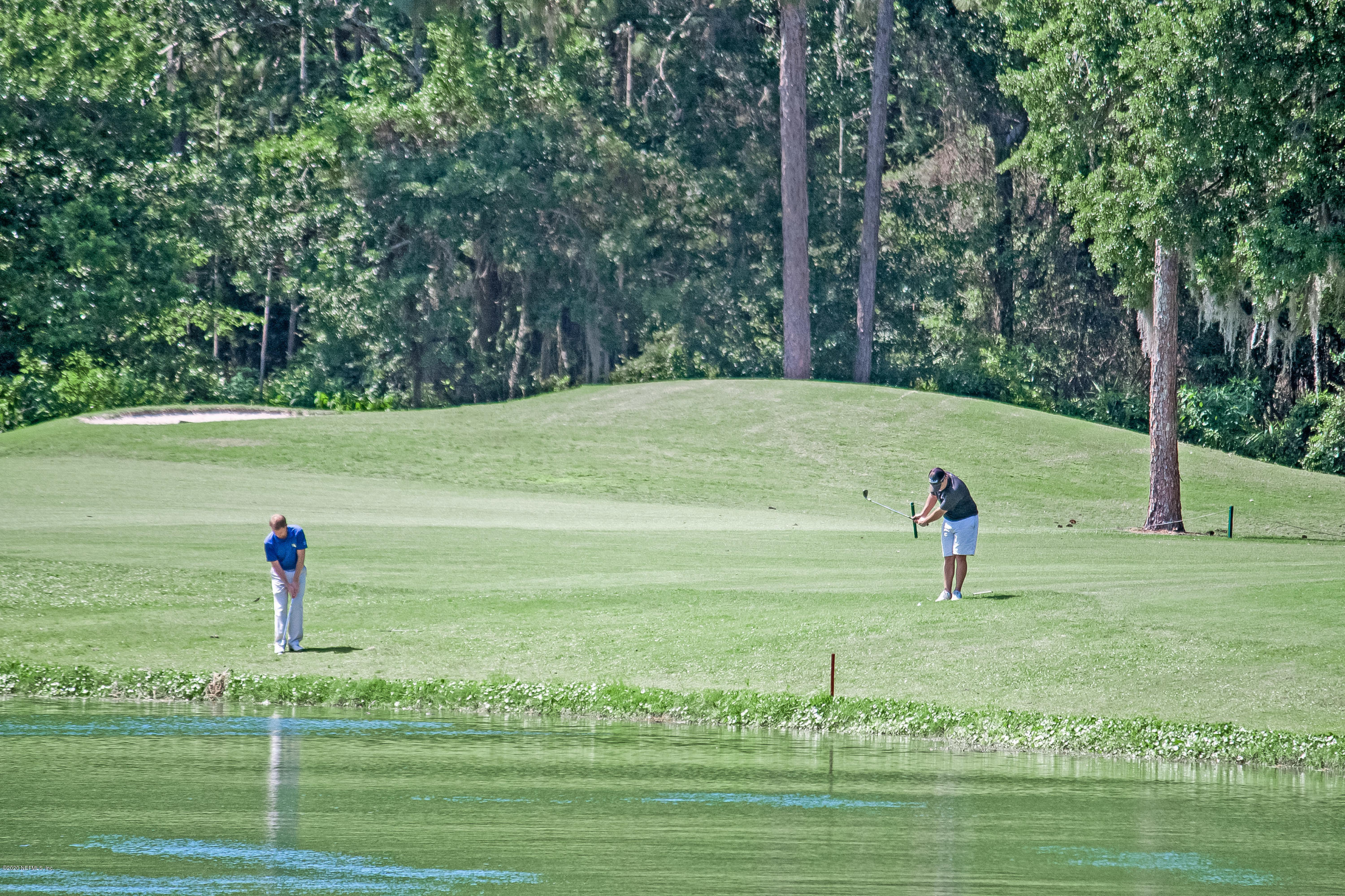 2021 Sailview Road St. Johns, FL 32259 - Photo 41 of 45 a view of a golf course with a lake