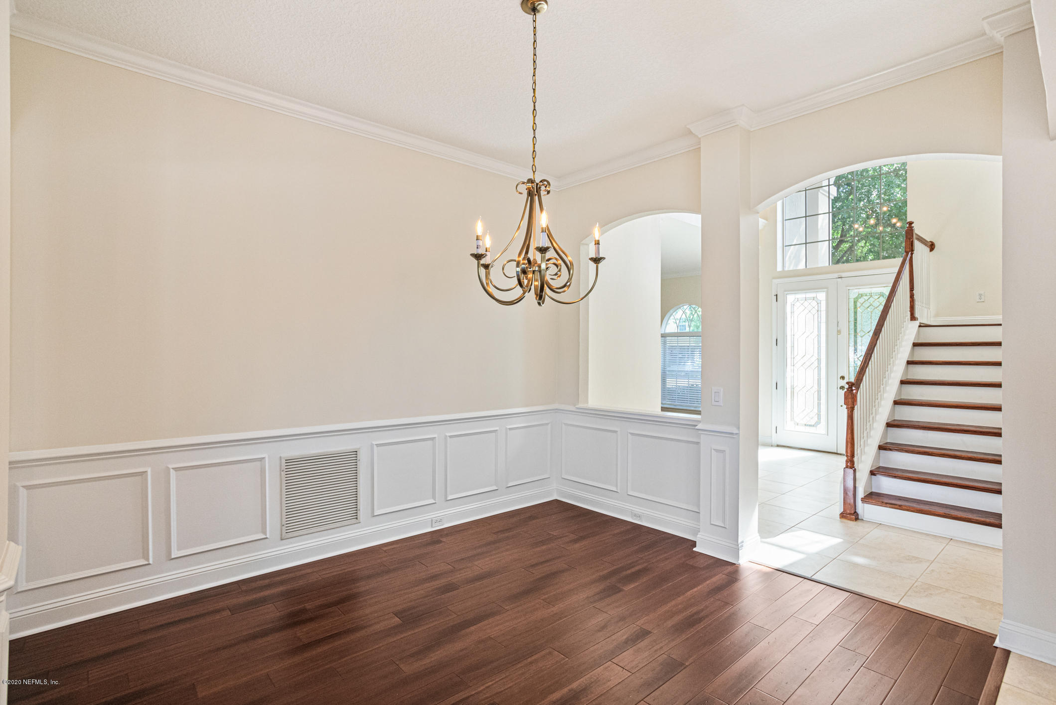 2021 Sailview Road St. Johns, FL 32259 - Photo 5 of 45 a view of an empty room with wooden floor and windows