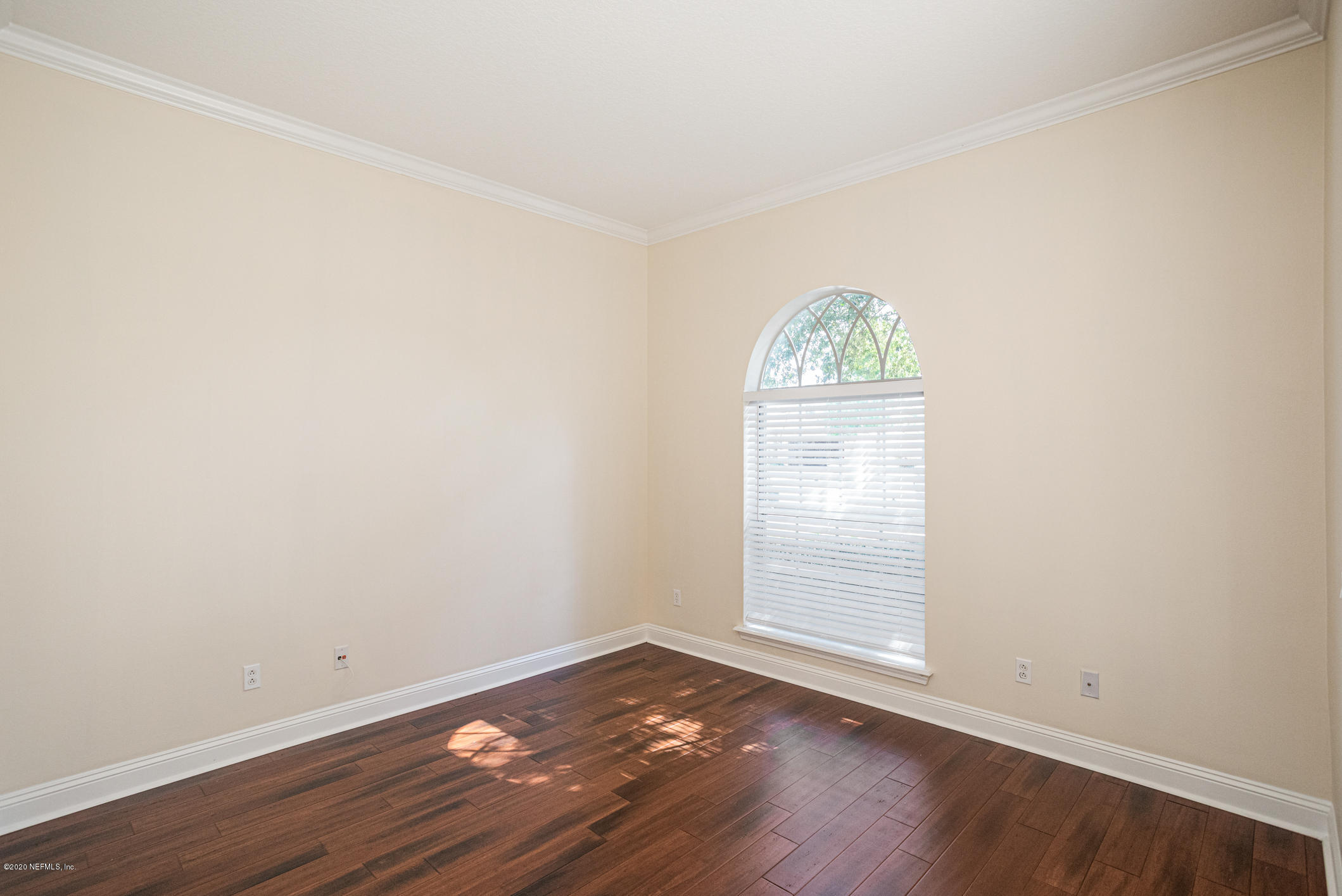 2021 Sailview Road St. Johns, FL 32259 - Photo 6 of 45 an empty room with wooden floor and windows