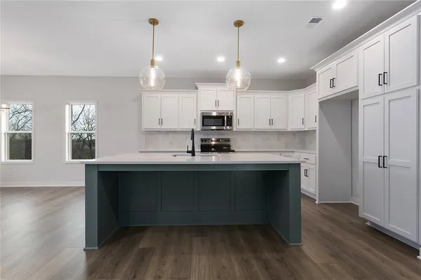 $463,000 | 110 Woodland Avenue, Lone Jack, MO 64070