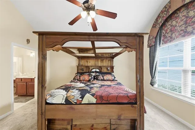 a bathroom with a shower and toilet