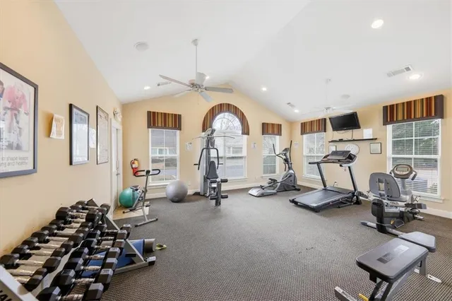 a view of house with a yard