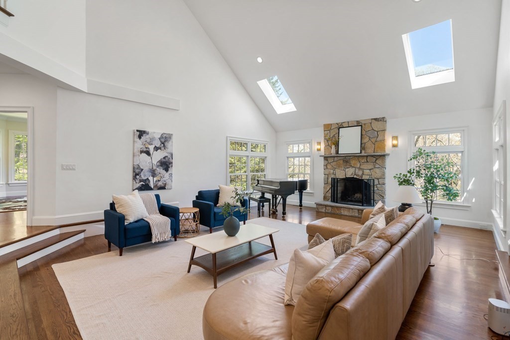 10 Forest Hill Road Wayland, MA 01778 - Photo 14 of 41 a living room with furniture a fireplace and a window