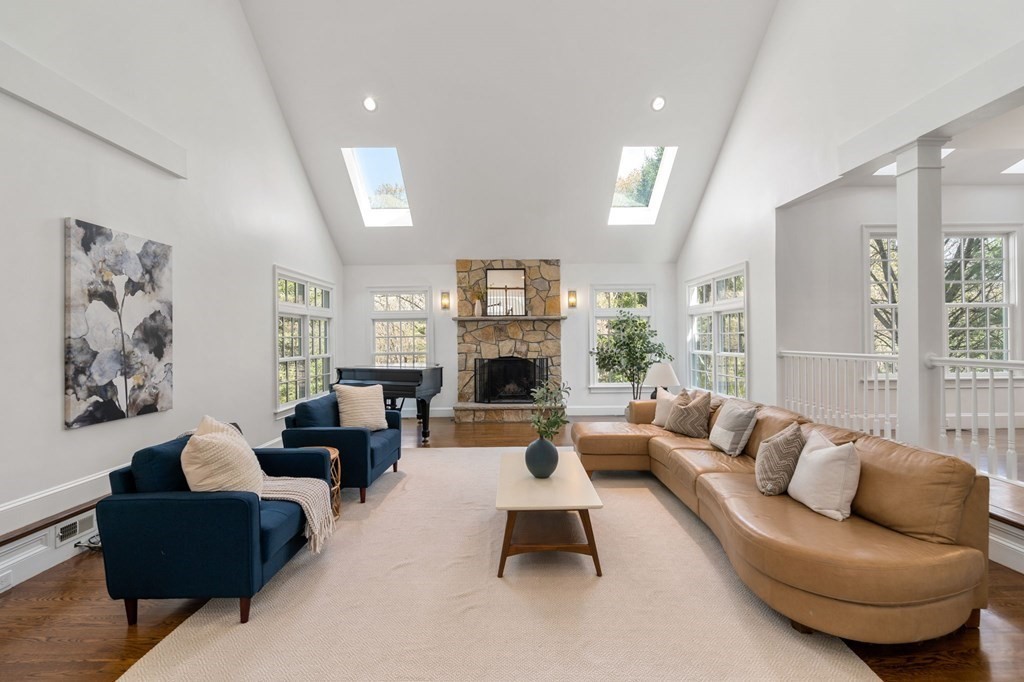 10 Forest Hill Road Wayland, MA 01778 - Photo 15 of 41 a living room with furniture and a fireplace