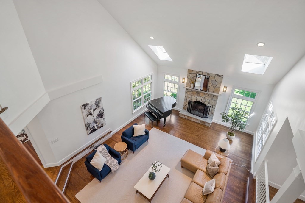 10 Forest Hill Road Wayland, MA 01778 - Photo 18 of 41 a living room with furniture and a fireplace