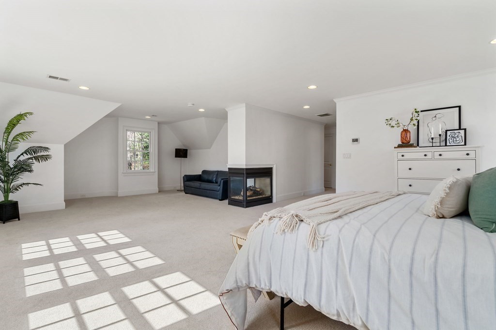 10 Forest Hill Road Wayland, MA 01778 - Photo 25 of 41 a bedroom with a bed and a window