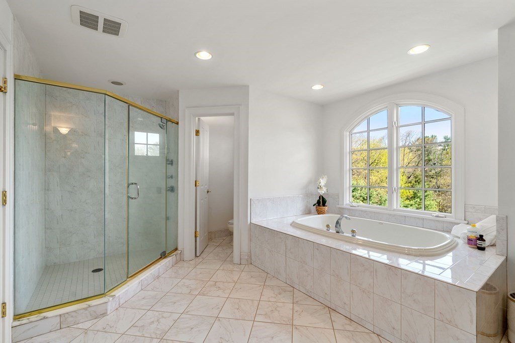 10 Forest Hill Road Wayland, MA 01778 - Photo 26 of 41 a spacious bathroom with a tub shower and sink