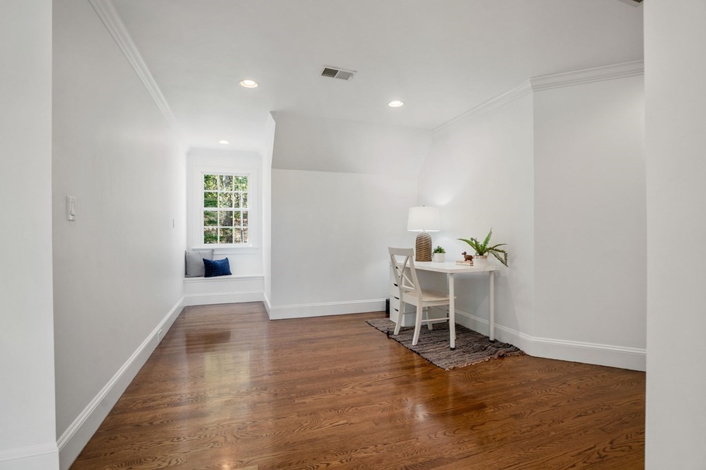 10 Forest Hill Road Wayland, MA 01778 - Photo 29 of 41 a view of a room with wooden floor and a window