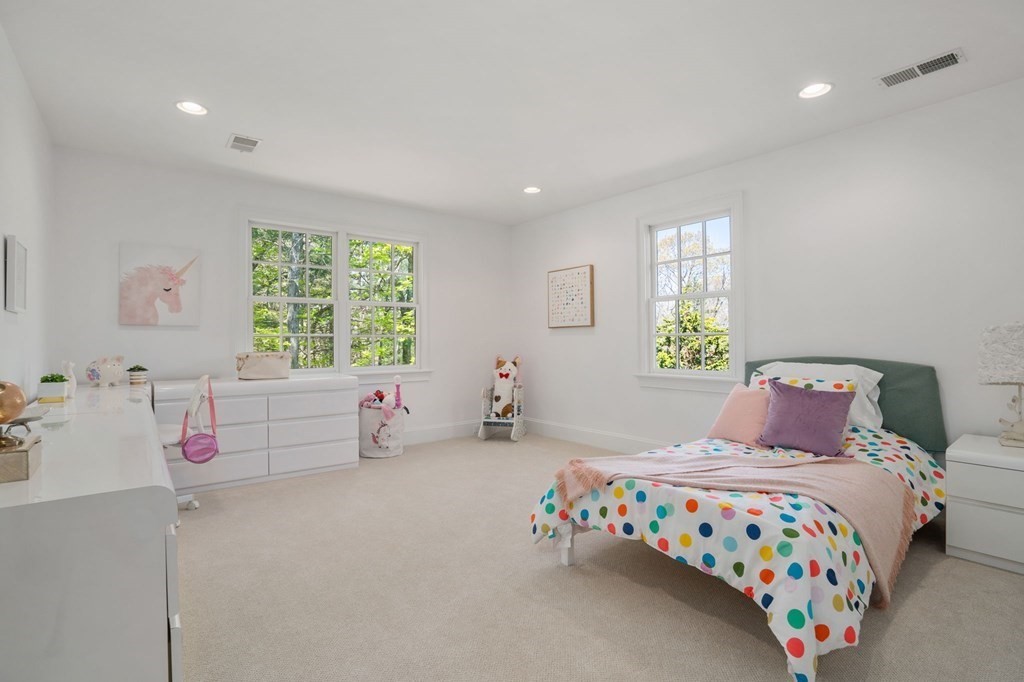 10 Forest Hill Road Wayland, MA 01778 - Photo 33 of 41 a bedroom with a bed and a window