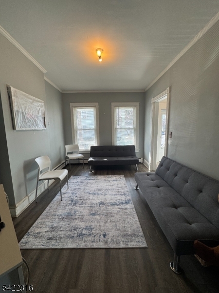 17 Cleveland Street Morristown, NJ 07960 - Photo 2 of 14 a living room with furniture and a rug