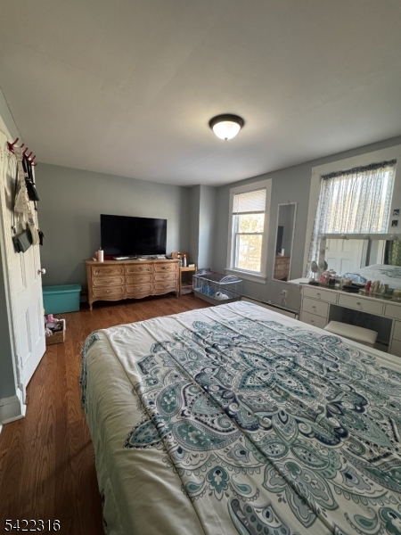 17 Cleveland Street Morristown, NJ 07960 - Photo 5 of 14 a bedroom with a large bed and a window