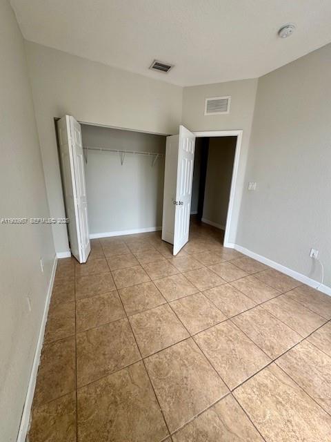 12925 Southwest 134th Terrace Miami, FL 33186 - Photo 13 of 26 a view of a livingroom with an empty space and a window