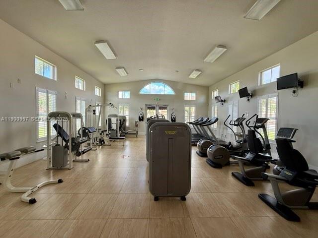 12925 Southwest 134th Terrace Miami, FL 33186 - Photo 22 of 26 a view of a room with gym equipment