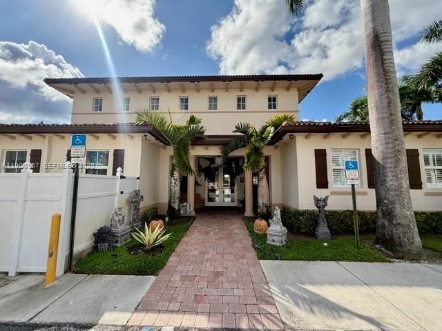 12925 Southwest 134th Terrace Miami, FL 33186 - Photo 25 of 26 a front view of a house with garden