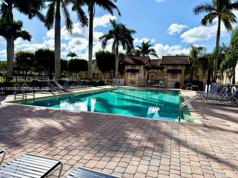 12925 Southwest 134th Terrace Miami, FL 33186 - Photo 26 of 26 a view of a park with a yard and a fountain