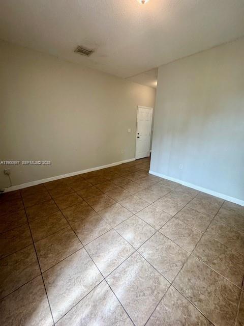 12925 Southwest 134th Terrace Miami, FL 33186 - Photo 4 of 26 a view of an empty room