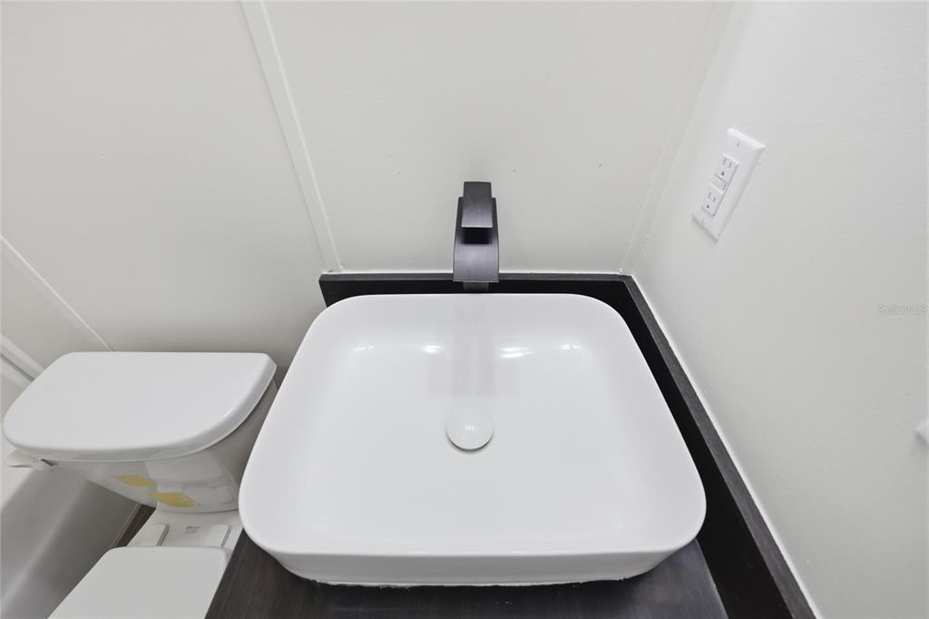 215 Southwest Alpine Place High Springs, FL 32643 - Photo 20 of 41 a bathroom with a toilet and a sink