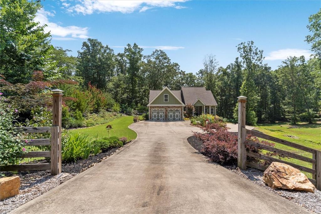 2800 Sam Nelson Road Canton, GA 30114 - Photo 1 of 1 a house view with a garden space
