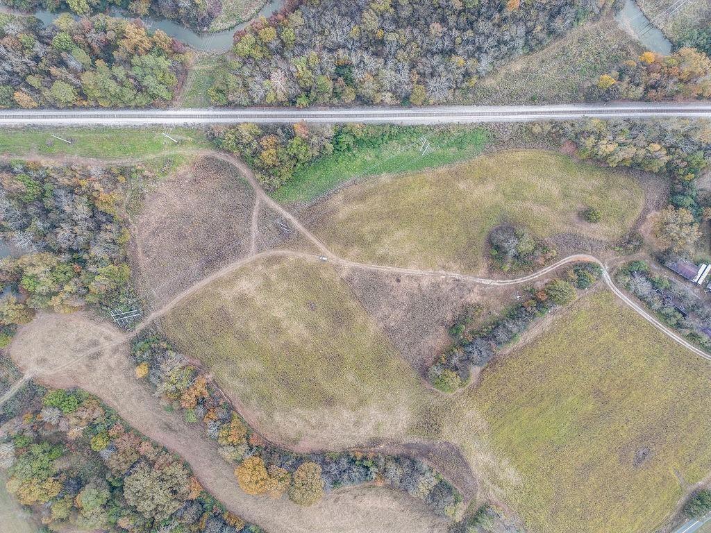 490 McDaniel Station Road Southwest Calhoun, GA 30701 - Photo 9 of 10 a view of a swimming pool with a yard