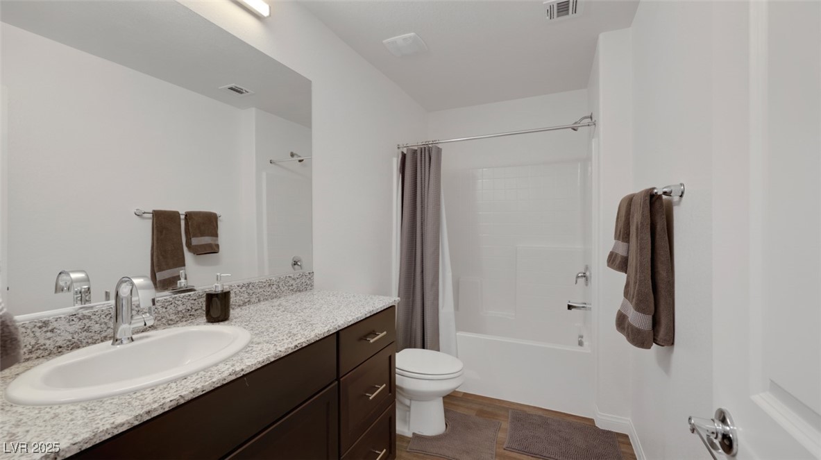12346 Indigo Montage Road, Unit 4 Las Vegas, NV 89183 - Photo 21 of 27 Full bath featuring shower / tub combo and vanity