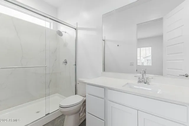 an empty room with closet area